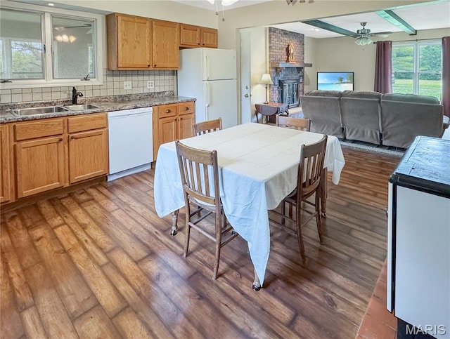 4423 Project Rd, Luebbering, MO 63061 - kitchen with white appliances, a sink, a ceiling fan, and wood finished floors