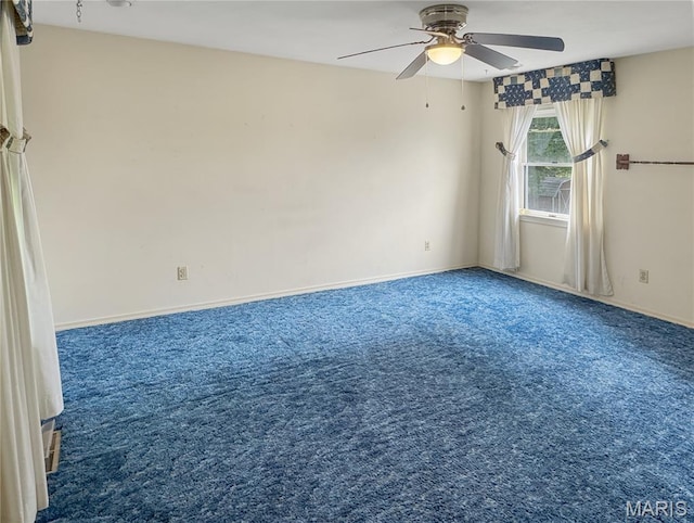 4423 Project Rd, Luebbering, MO 63061 - spare room featuring carpet flooring, a ceiling fan, and baseboards