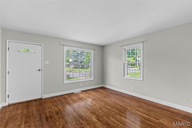 2490 Mullanphy Ln, Florissant, MO 63031 - foyer featuring baseboards and wood finished floors