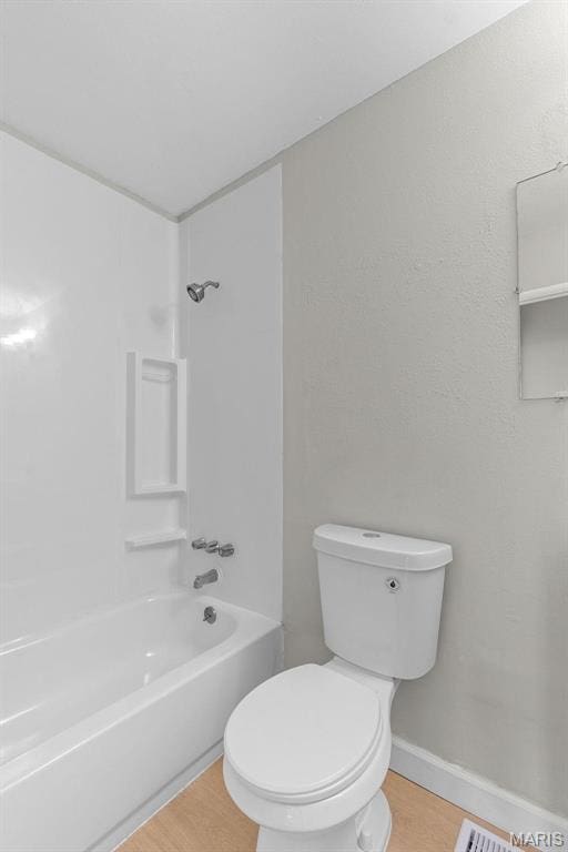 2490 Mullanphy Ln, Florissant, MO 63031 - full bathroom featuring bathing tub / shower combination and wood finished floors