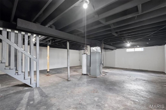 2490 Mullanphy Ln, Florissant, MO 63031 - basement with water heater, stairway, and heating unit