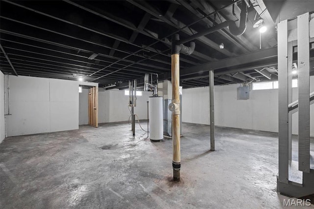 2490 Mullanphy Ln, Florissant, MO 63031 - below grade area featuring water heater and electric panel