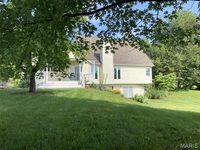 225 Country Crest Ln, Union, MO 63084 - rear view of property featuring a yard, roof with shingles, and a chimney