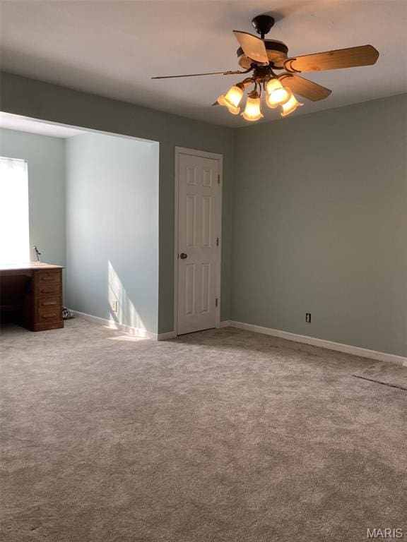 225 Country Crest Ln, Union, MO 63084 - unfurnished bedroom with light carpet, ceiling fan, and a desk