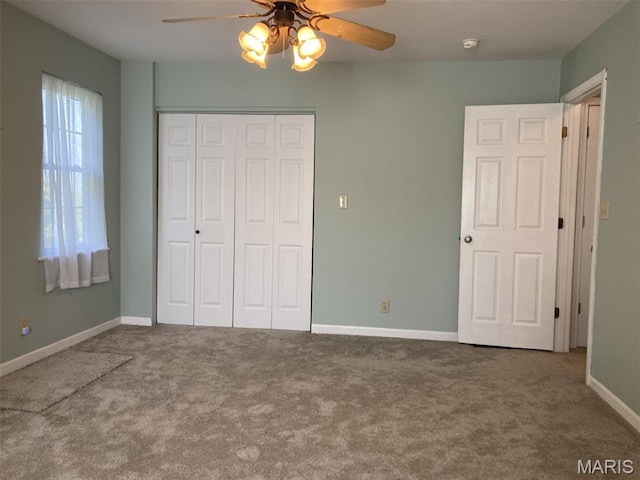 225 Country Crest Ln, Union, MO 63084 - unfurnished bedroom with carpet floors, a closet, and a ceiling fan
