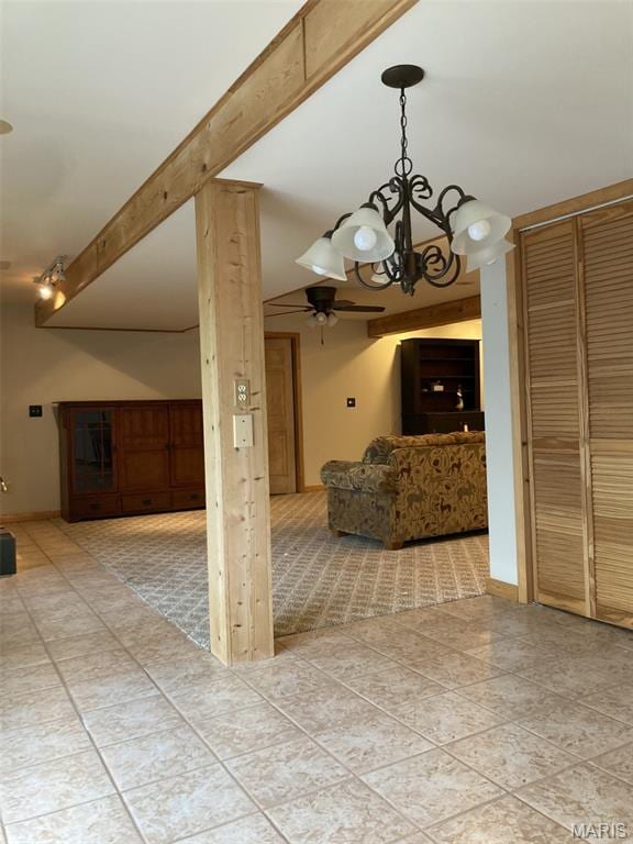 225 Country Crest Ln, Union, MO 63084 - unfurnished living room featuring a chandelier, tile patterned floors, and a ceiling fan