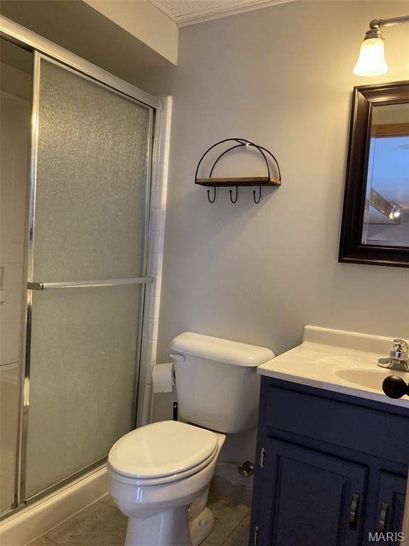 225 Country Crest Ln, Union, MO 63084 - full bathroom featuring vanity, tile patterned floors, and a stall shower