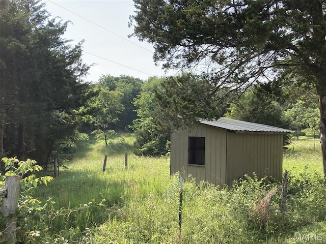 225 Country Crest Ln, Union, MO 63084 - view of outbuilding featuring a forest view