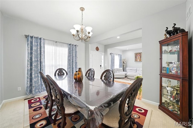 1147 Spring Orchard Dr, Ofallon, MO 63368 - dining room featuring a chandelier, plenty of natural light, light colored carpet, and recessed lighting