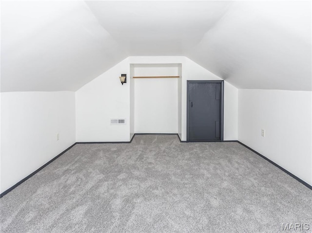 530 Poplar St, Highland, IL 62249 - additional living space with carpet and lofted ceiling