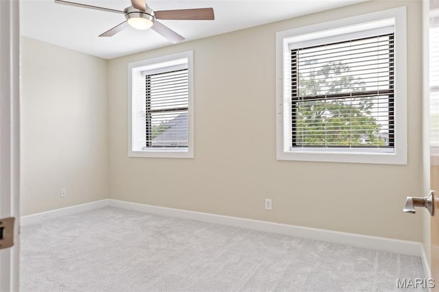 4220 Mcpherson Ave Unit 303, Saint Louis, MO 63108 - unfurnished room with carpet, healthy amount of natural light, and ceiling fan
