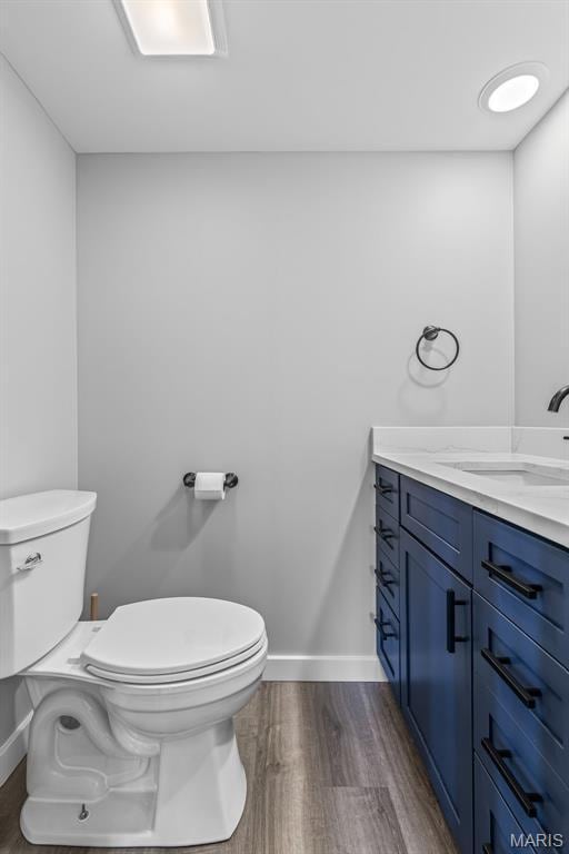 422 N 2nd St, De Soto, MO 63020 - half bath with vanity and wood finished floors