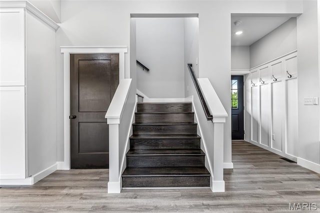422 N 2nd St, De Soto, MO 63020 - stairs with wood finished floors and recessed lighting