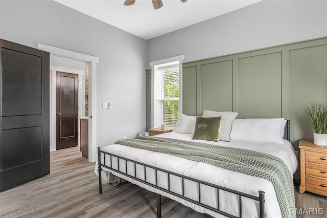 422 N 2nd St, De Soto, MO 63020 - bedroom featuring light wood-style floors and ceiling fan