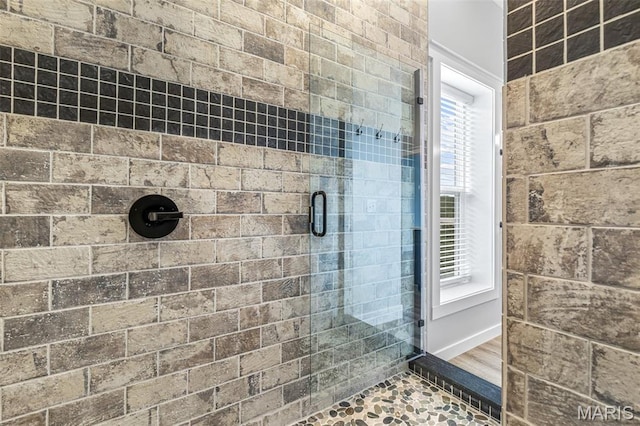 422 N 2nd St, De Soto, MO 63020 - full bathroom featuring a tile shower