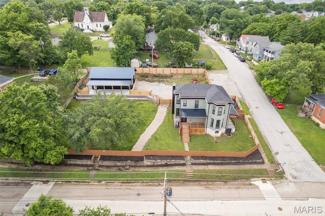 422 N 2nd St, De Soto, MO 63020 - aerial view of residential area featuring a tree filled landscape