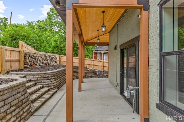 422 N 2nd St, De Soto, MO 63020 - fenced backyard featuring a patio area