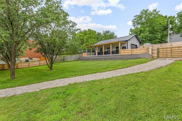422 N 2nd St, De Soto, MO 63020 - back of house featuring a fenced backyard