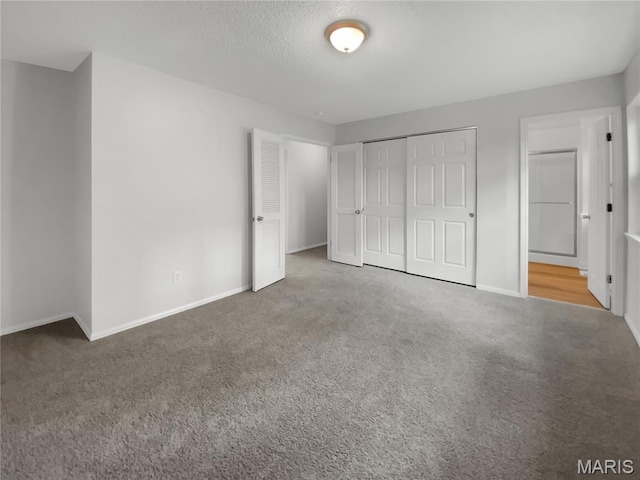 887 Totem Woods Ct, Manchester, MO 63021 - unfurnished bedroom with carpet floors and a closet