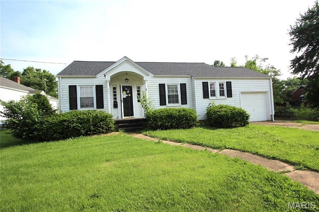 205 Deguire, Fredericktown, MO 63645 - view of front of property featuring an attached garage, concrete driveway, and a front lawn