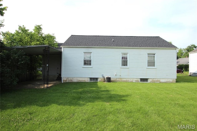 205 Deguire, Fredericktown, MO 63645 - rear view of property featuring a yard and a detached carport