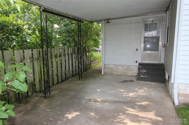 205 Deguire, Fredericktown, MO 63645 - view of patio / terrace featuring a carport
