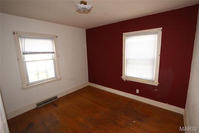 205 Deguire, Fredericktown, MO 63645 - empty room with wood finished floors and baseboards