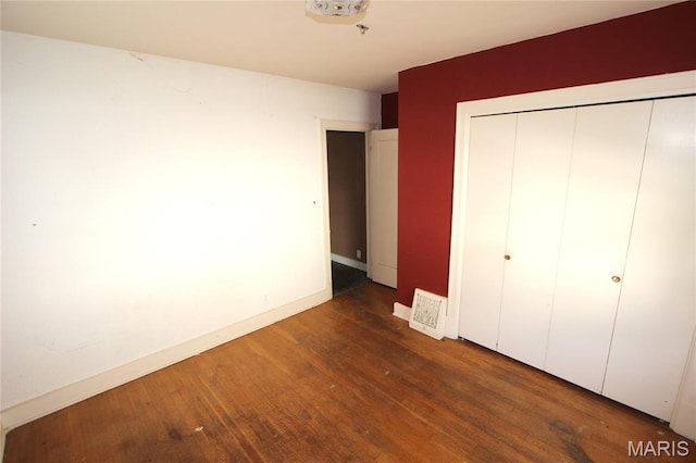 205 Deguire, Fredericktown, MO 63645 - unfurnished bedroom with wood finished floors and a closet
