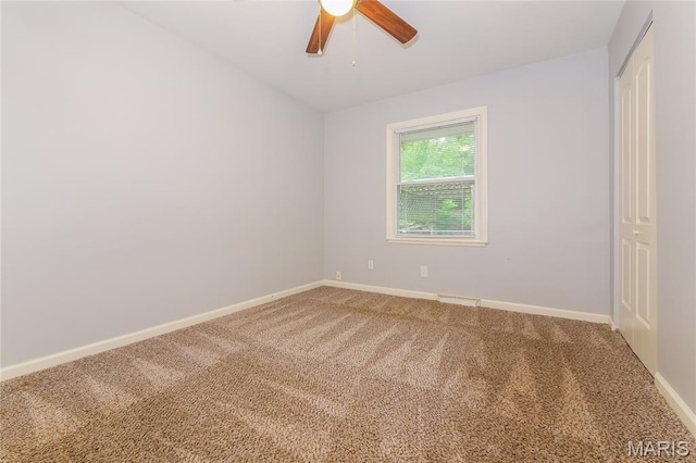 3702 E 106th Ter, Kansas City, MO 64137 - spare room featuring carpet floors and ceiling fan