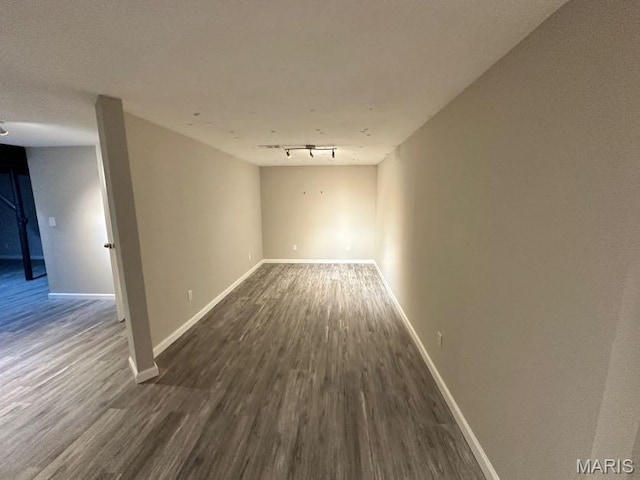69 Jakes Ct, Ofallon, MO 63366 - empty room featuring dark wood-style floors and baseboards