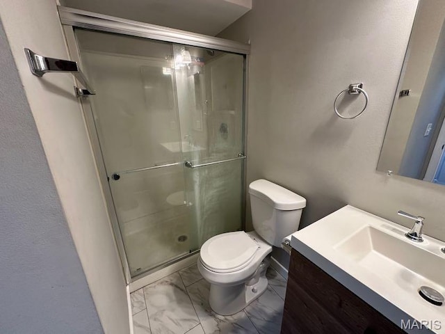 69 Jakes Ct, Ofallon, MO 63366 - full bathroom featuring marble finish flooring, a shower stall, and vanity
