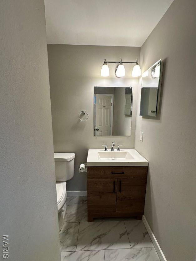 69 Jakes Ct, Ofallon, MO 63366 - bathroom with marble finish floors and vanity