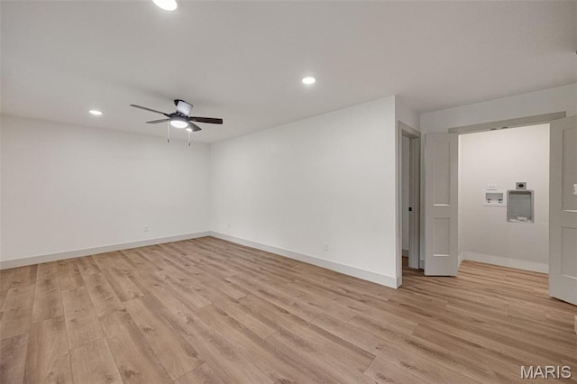 10293 Strange Rd, Potosi, MO 63664 - empty room with a ceiling fan, light wood-style floors, and recessed lighting