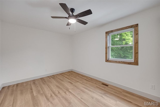 10293 Strange Rd, Potosi, MO 63664 - unfurnished room with light wood-style floors and a ceiling fan