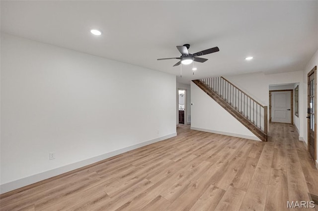 10293 Strange Rd, Potosi, MO 63664 - unfurnished living room featuring recessed lighting, a ceiling fan, stairs, and light wood-style flooring