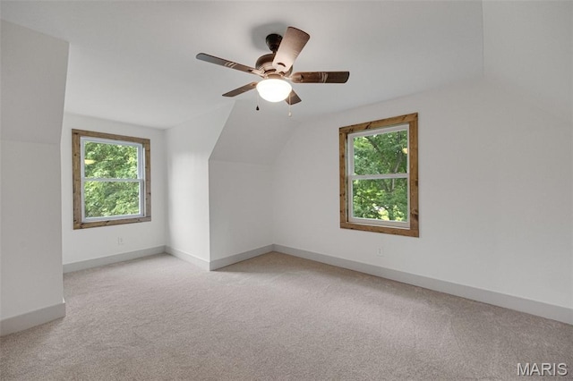10293 Strange Rd, Potosi, MO 63664 - additional living space with lofted ceiling, light colored carpet, plenty of natural light, and ceiling fan