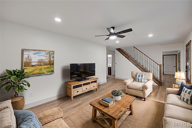 10293 Strange Rd, Potosi, MO 63664 - living room with stairs, a ceiling fan, recessed lighting, and light wood-style flooring