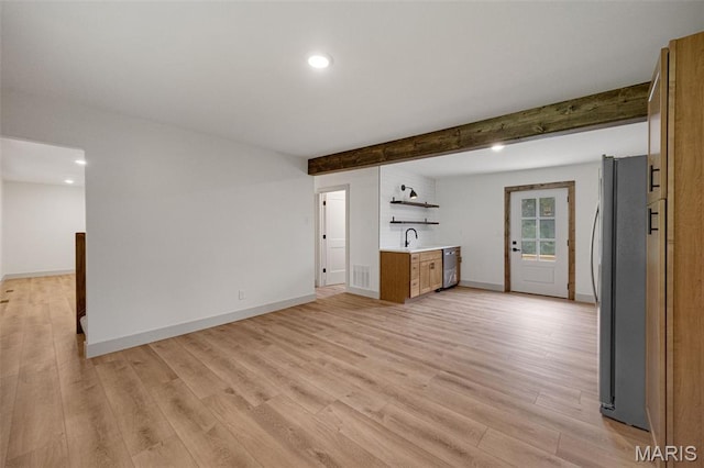 10293 Strange Rd, Potosi, MO 63664 - unfurnished living room with light wood finished floors, recessed lighting, and beamed ceiling