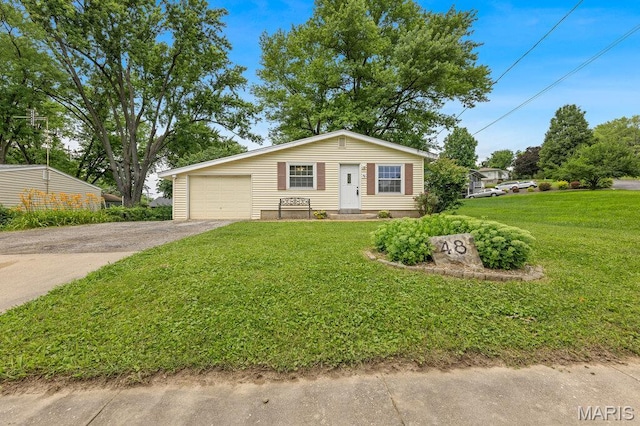 48 Marie Dr, Saint Charles, MO 63301 - view of front of property featuring driveway and a front yard