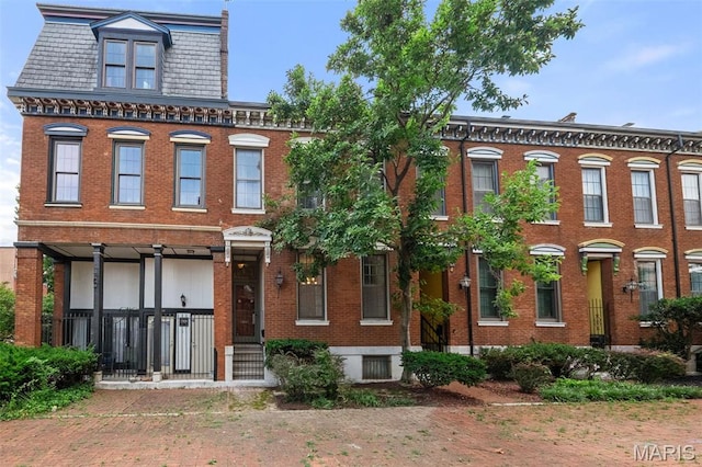1302 S 10th, Saint Louis, MO 63104 - view of front of house featuring brick siding, mansard roof, and a high end roof