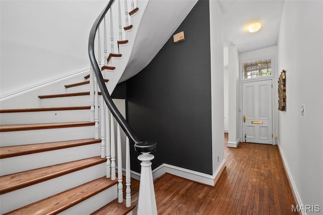 1302 S 10th, Saint Louis, MO 63104 - staircase featuring hardwood / wood-style floors and baseboards