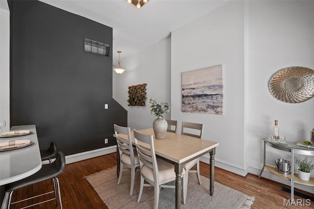 1302 S 10th, Saint Louis, MO 63104 - dining space with wood finished floors and baseboards