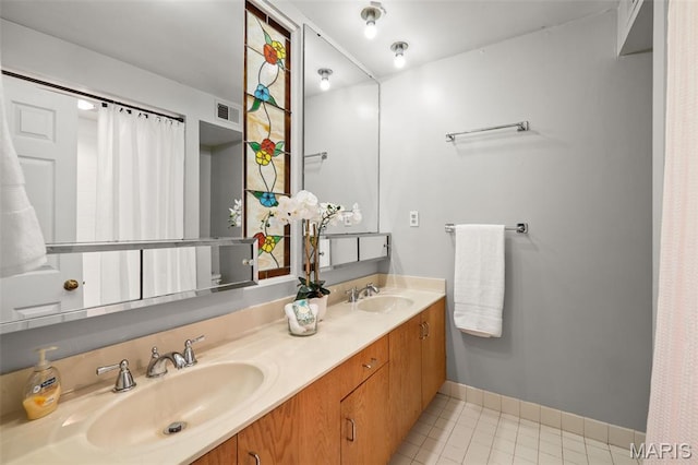 1302 S 10th, Saint Louis, MO 63104 - bathroom featuring double vanity and tile patterned flooring