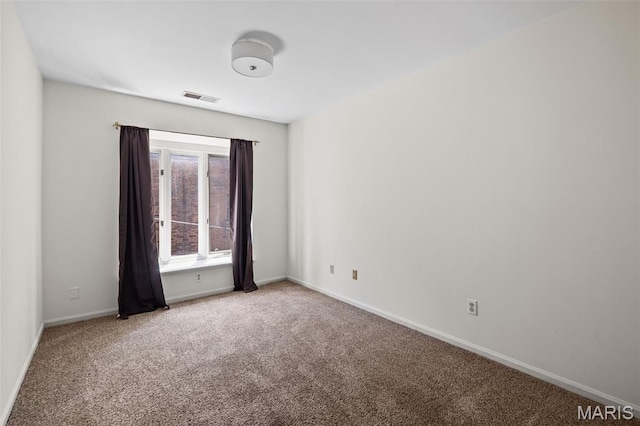 1302 S 10th, Saint Louis, MO 63104 - carpeted spare room with baseboards