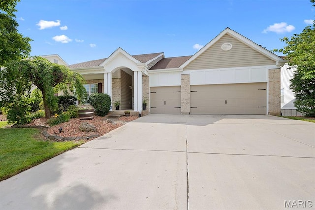 6 Wolverton Ct, Saint Charles, MO 63301 - single story home with a garage, driveway, and brick siding