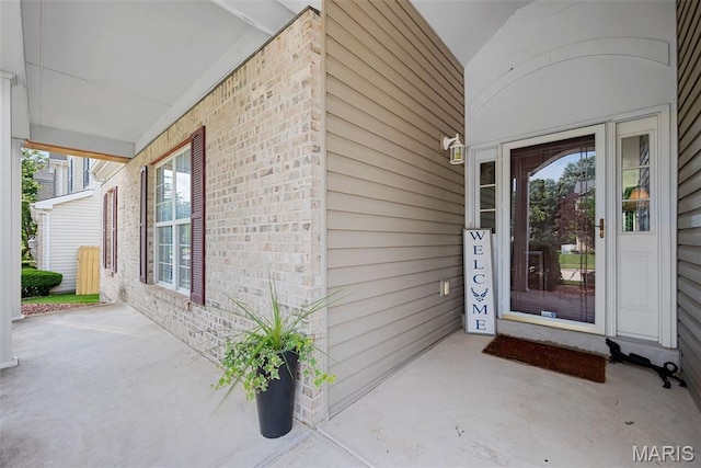 6 Wolverton Ct, Saint Charles, MO 63301 - entrance to property with brick siding and covered porch