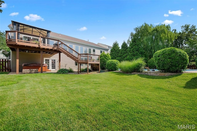 6 Wolverton Ct, Saint Charles, MO 63301 - rear view of house with a hot tub, a deck, and a yard