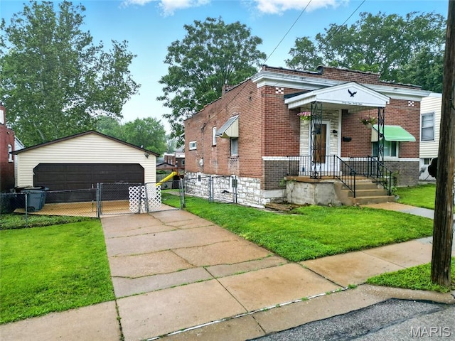 4934 Tiemann Ave, Saint Louis, MO 63123 - view of front of property featuring brick siding, a detached garage, an outdoor structure, and a gate