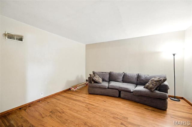 4934 Tiemann Ave, Saint Louis, MO 63123 - living room with wood finished floors