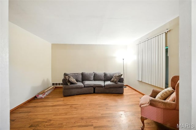 4934 Tiemann Ave, Saint Louis, MO 63123 - living area with light wood-type flooring and baseboards